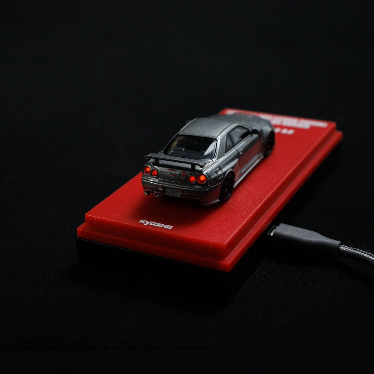 Kyosho 1:64 Nissan NISMO R34 GT-R Grey NISMO BNR34 CRS Version (MOTN LED Base Compatible)