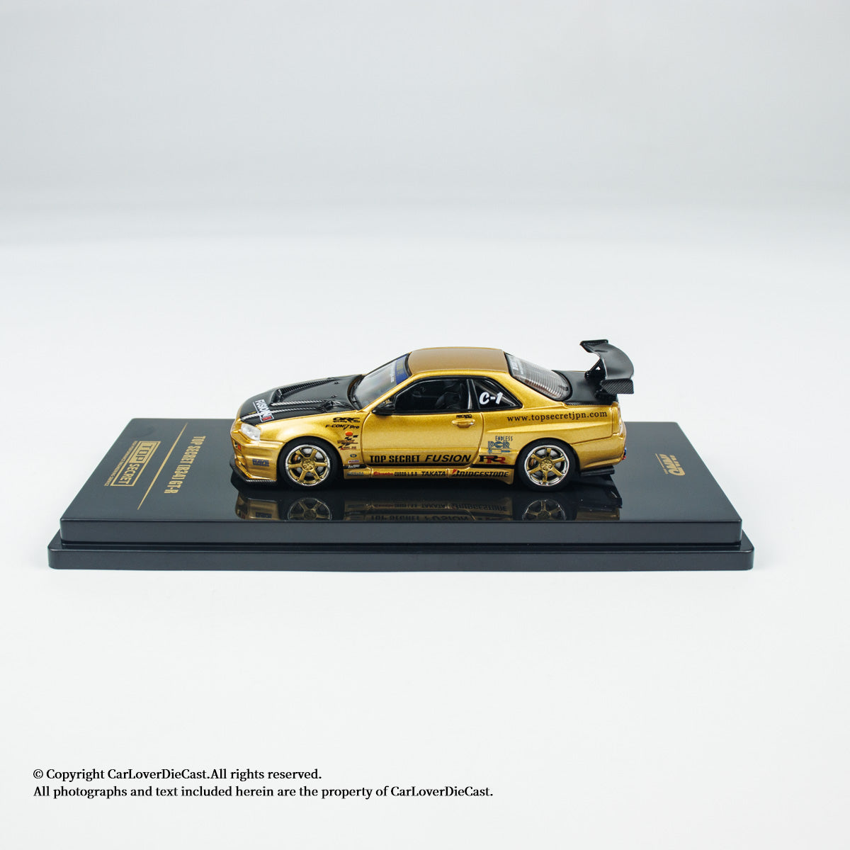 INNO64 1:64 Nissan TOP SECRET R34 GT-R Gold (IN64-R34TS-GOLD)