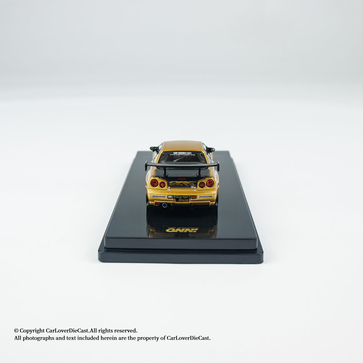 INNO64 1:64 Nissan TOP SECRET R34 GT-R Gold (IN64-R34TS-GOLD)