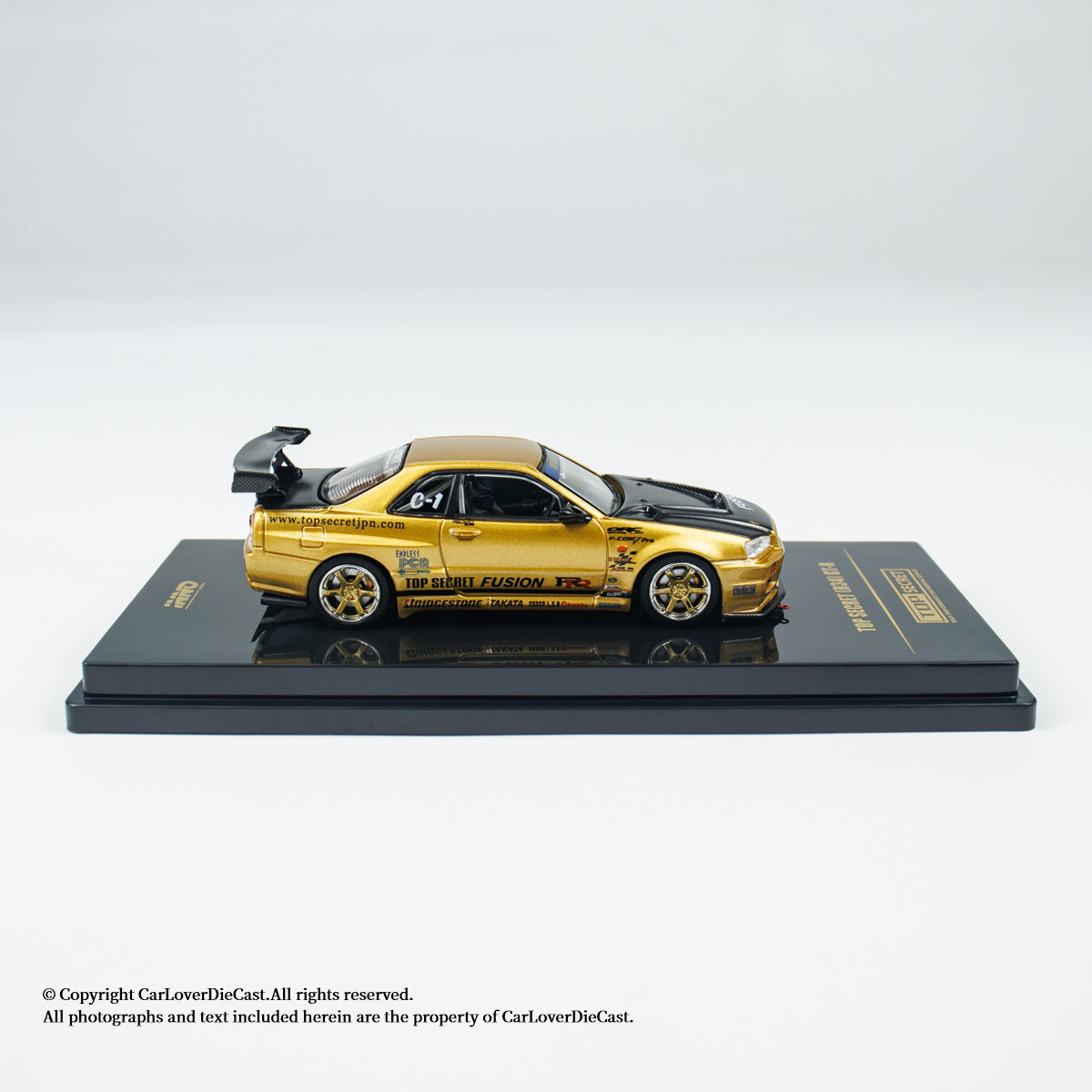 INNO64 1:64 Nissan TOP SECRET R34 GT-R Gold (IN64-R34TS-GOLD)