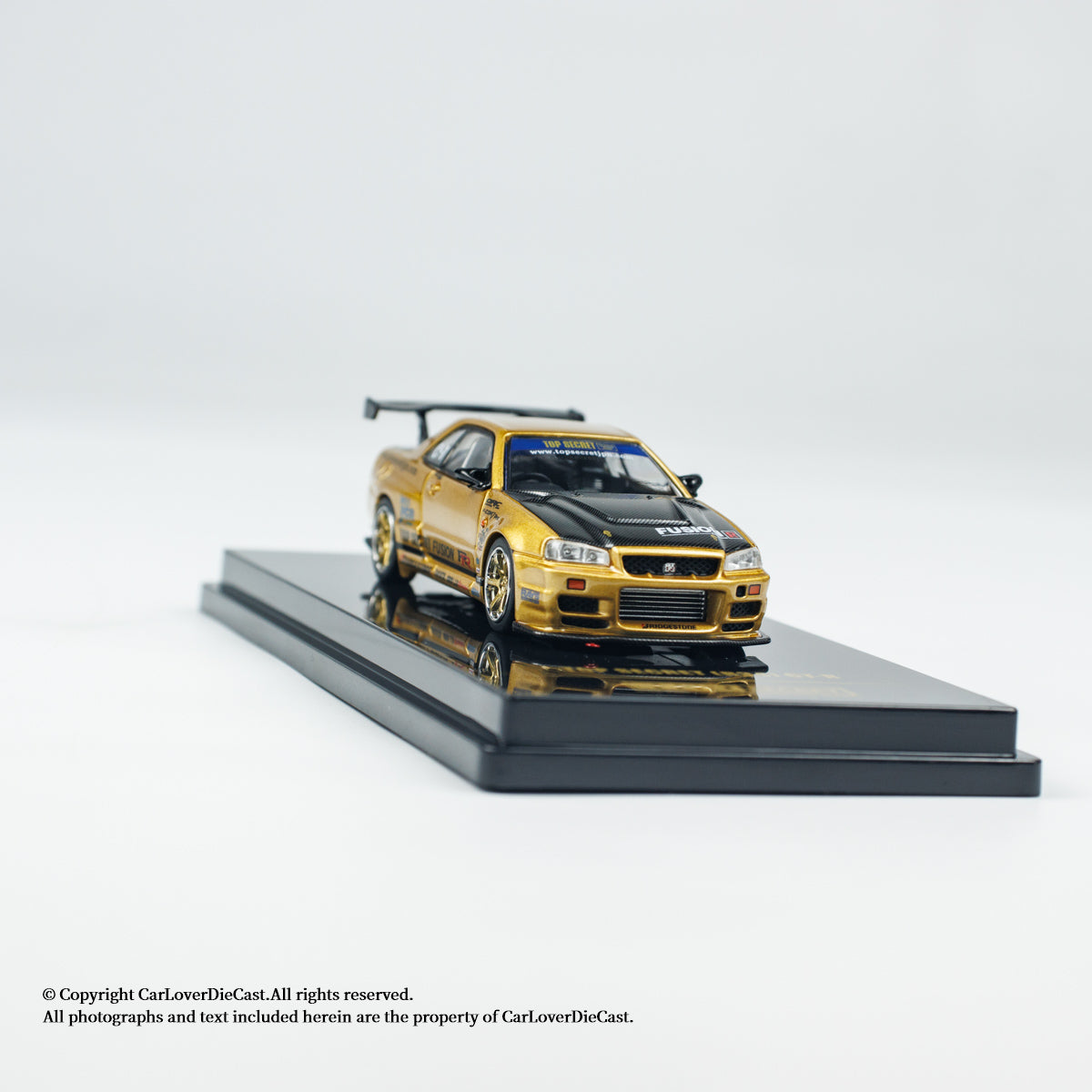 INNO64 1:64 Nissan TOP SECRET R34 GT-R Gold (IN64-R34TS-GOLD)