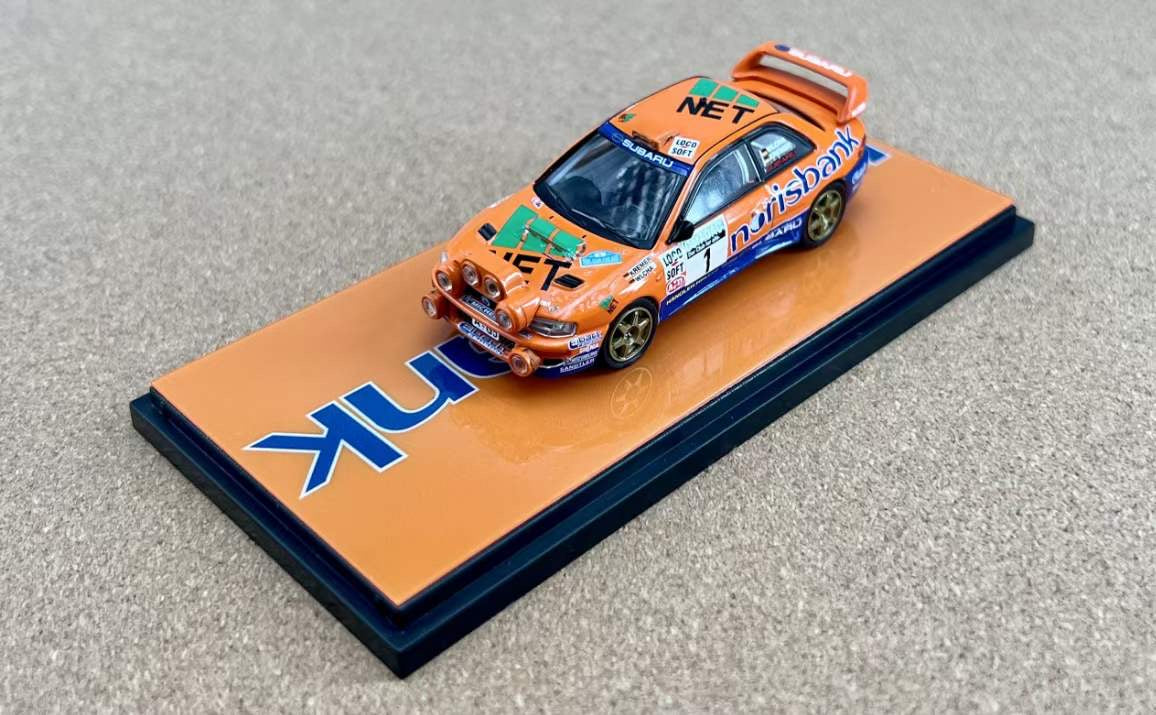Fine Works 1:64 Subaru Impreza WRC 2000 #1 Winner Norisbank Orange