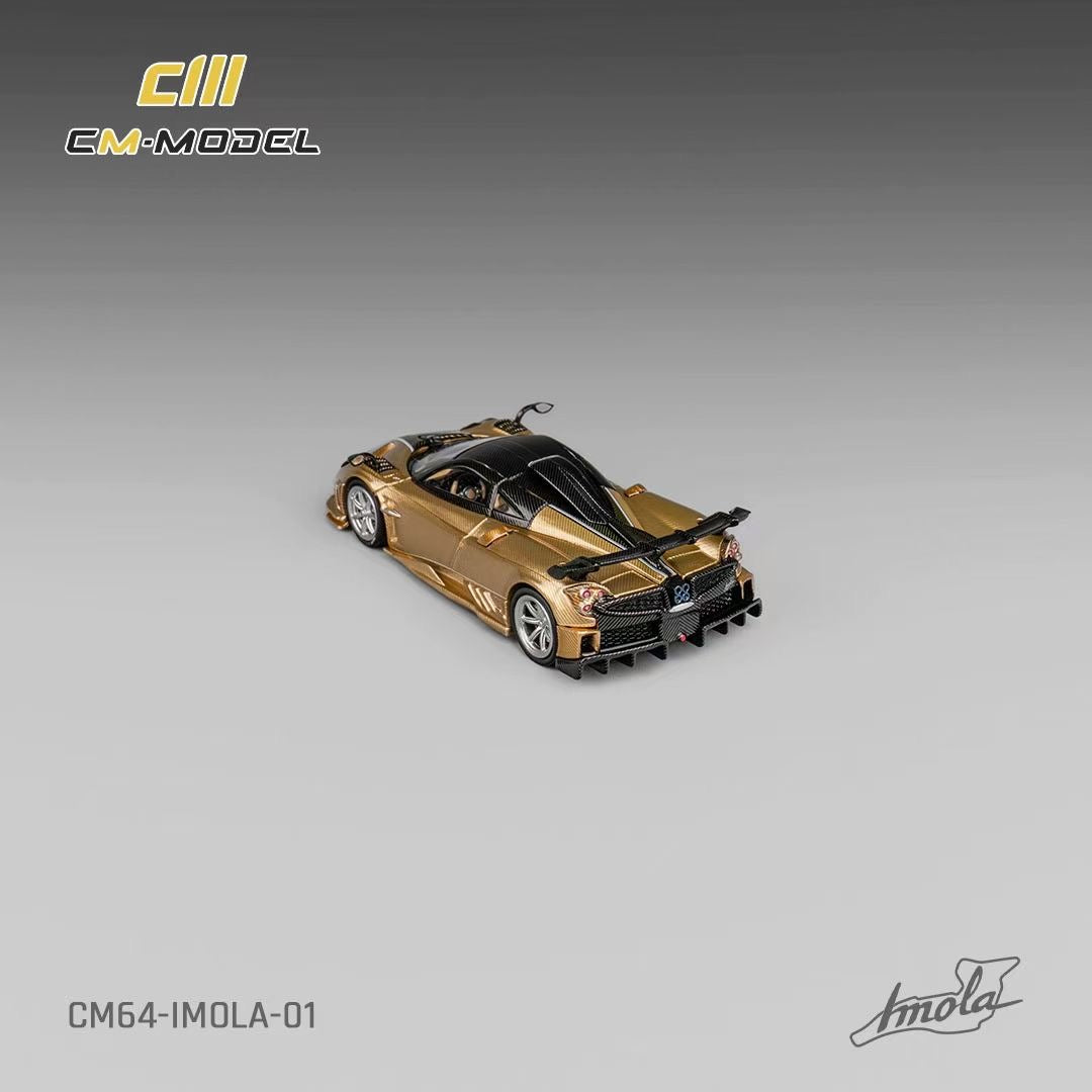 CM Model 1:64 Pagani Imola V12 Super Car Official Licensed Carbon Gold with Extra Wheel Set