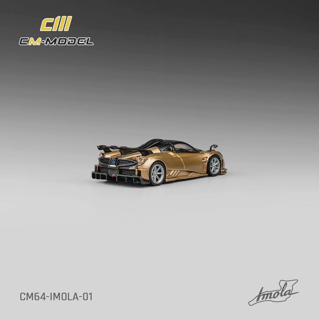 CM Model 1:64 Pagani Imola V12 Super Car Official Licensed Carbon Gold with Extra Wheel Set