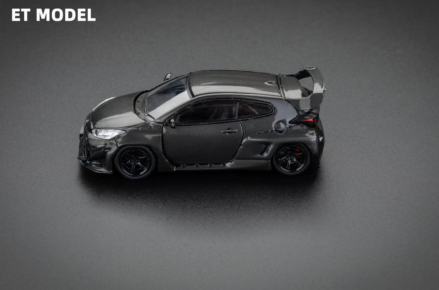 Fuji X ET Model 1:64 Toyota GR Yaris Pandem Rocket Bunny Wide Body Hot Hatch Full Carbon Black Limited 499 Pieces