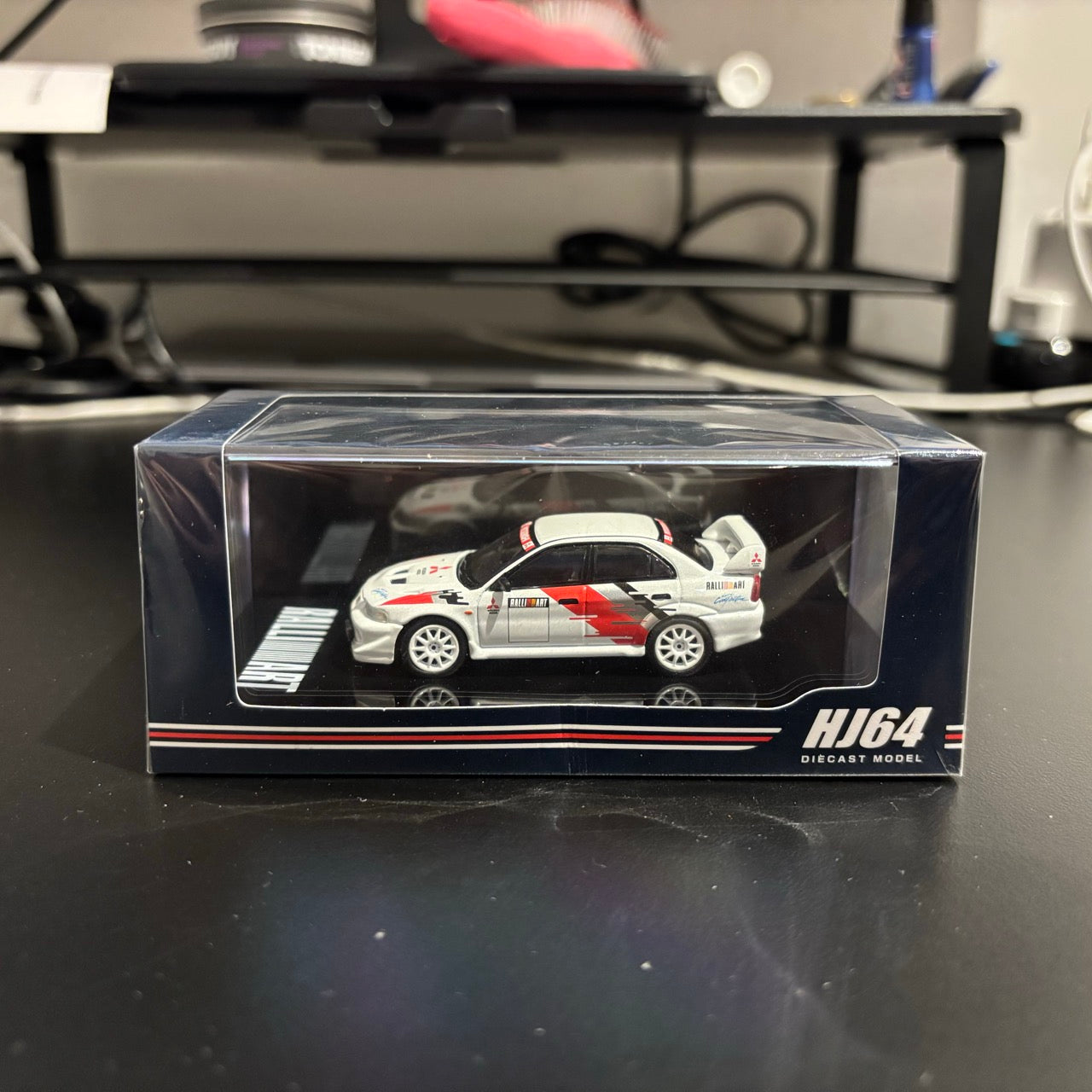 Hobby Japan 1:64 MITSUBISHI LANCER RS EVOLUTION 6 (CP9A) 2000 RALLIART WHITE Official Licensed (HJ643033RA)