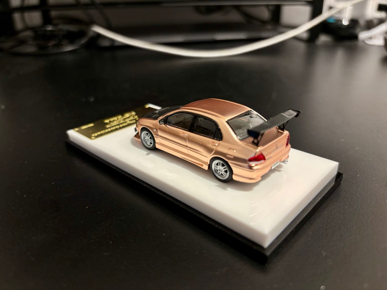 Model Collect 1:64 Mitsubishi Lancer Evolution 7 EVO VII Rose Gold with Carbon Hood