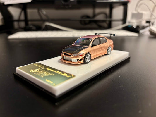 Model Collect 1:64 Mitsubishi Lancer Evolution 7 EVO VII Rose Gold with Carbon Hood