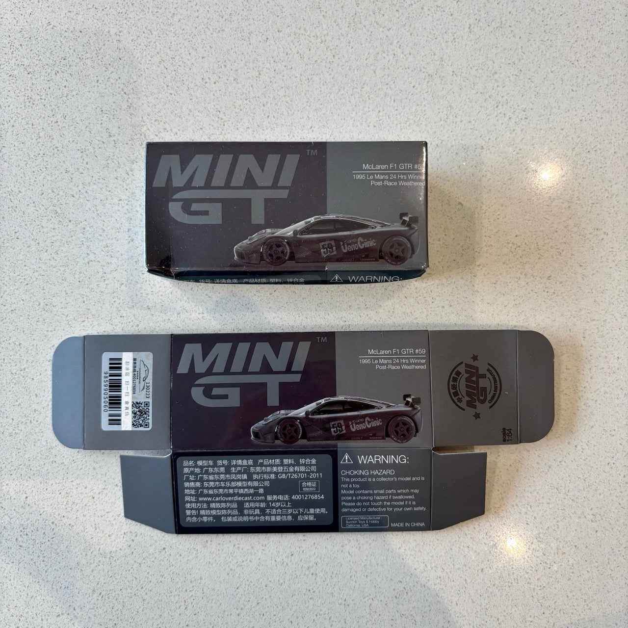 (Damaged Box with Replacement) Mini GT 1:64 McLaren F1 GTR #59 1995 Le Mans 24Hr Winner Post-Race Weathered (MGT00870-CH)