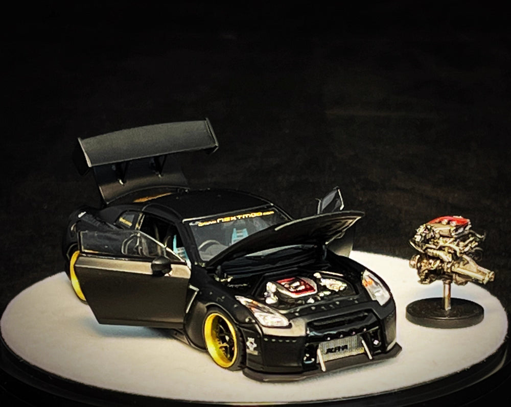 PGM 1:64 Nissan Skyline GT-R R35 Pandem Rocket Bunny Matt Black with Separated Display Engine Limited 999 Pieces (Premium Round Box Packaging)
