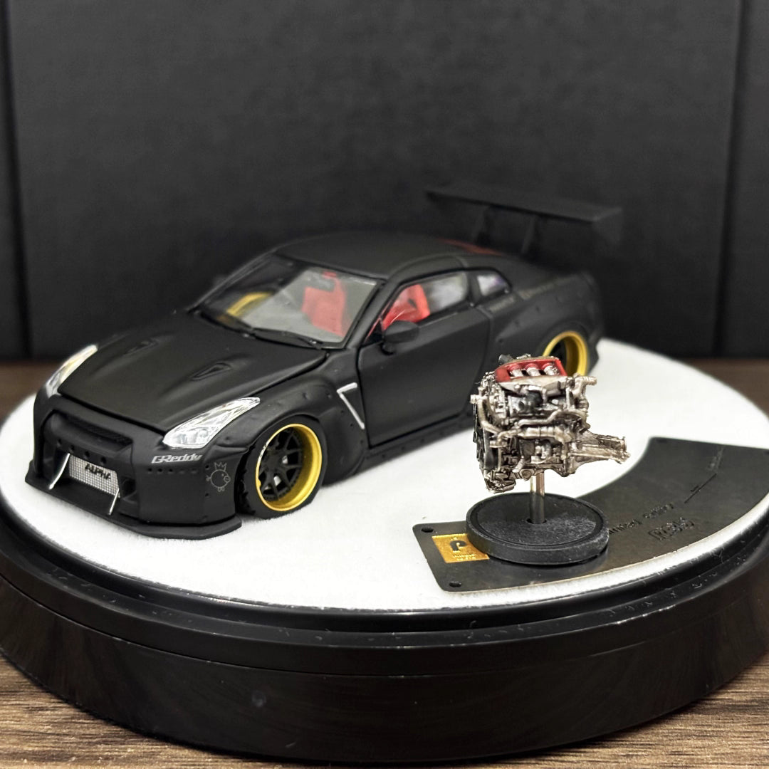 PGM 1:64 Nissan Skyline GT-R R35 Pandem Rocket Bunny Matt Black with Separated Display Engine Limited 999 Pieces (Premium Round Box Packaging)