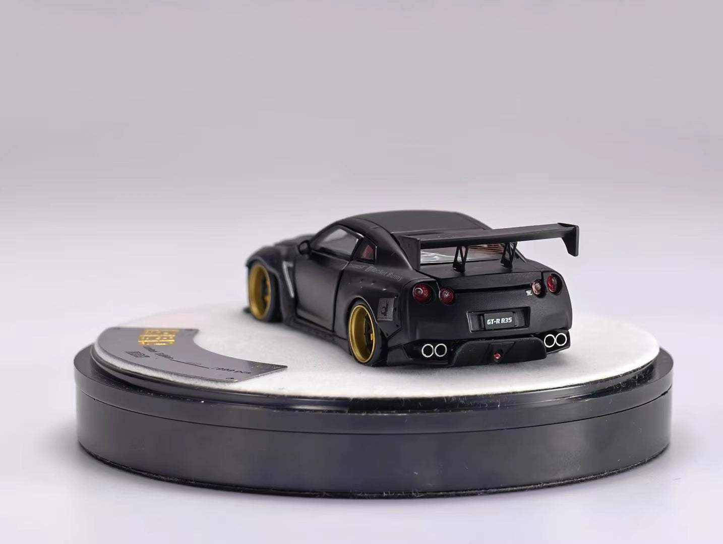 PGM 1:64 Nissan Skyline GT-R R35 Pandem Rocket Bunny Matt Black with Separated Display Engine Limited 999 Pieces (Premium Round Box Packaging)