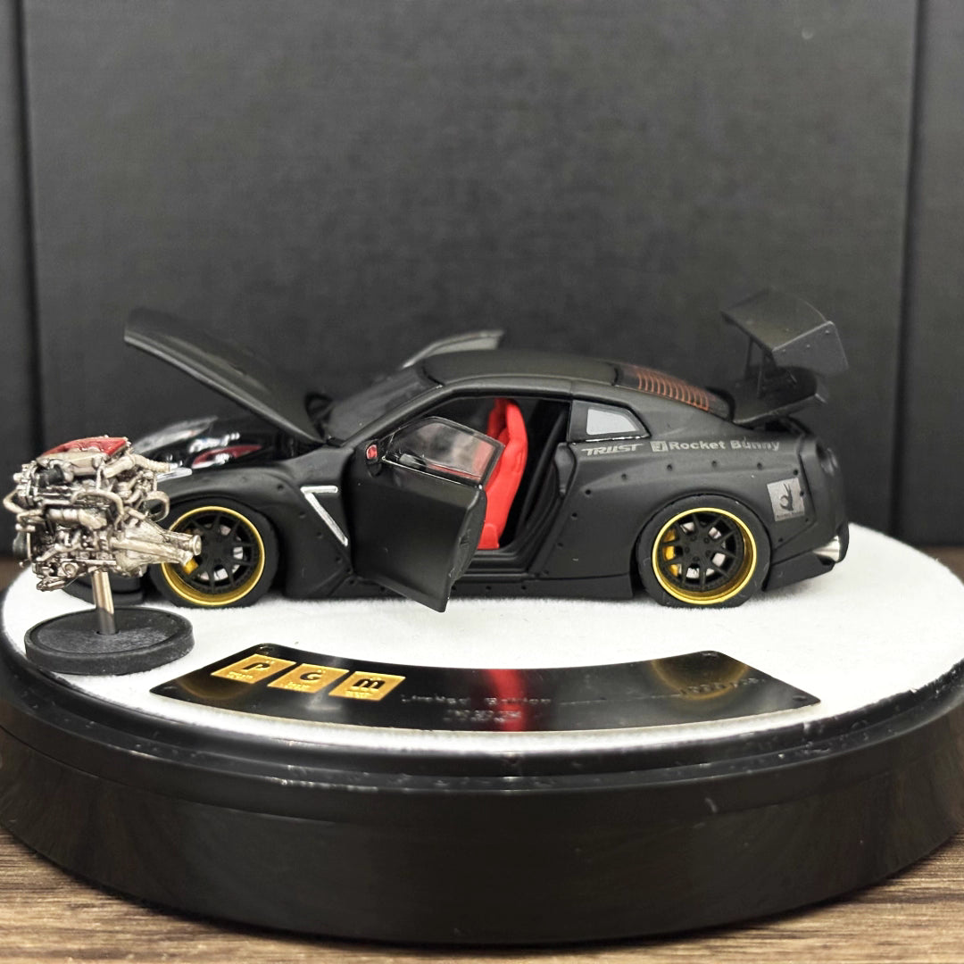 PGM 1:64 Nissan Skyline GT-R R35 Pandem Rocket Bunny Matt Black with Separated Display Engine Limited 999 Pieces (Premium Round Box Packaging)