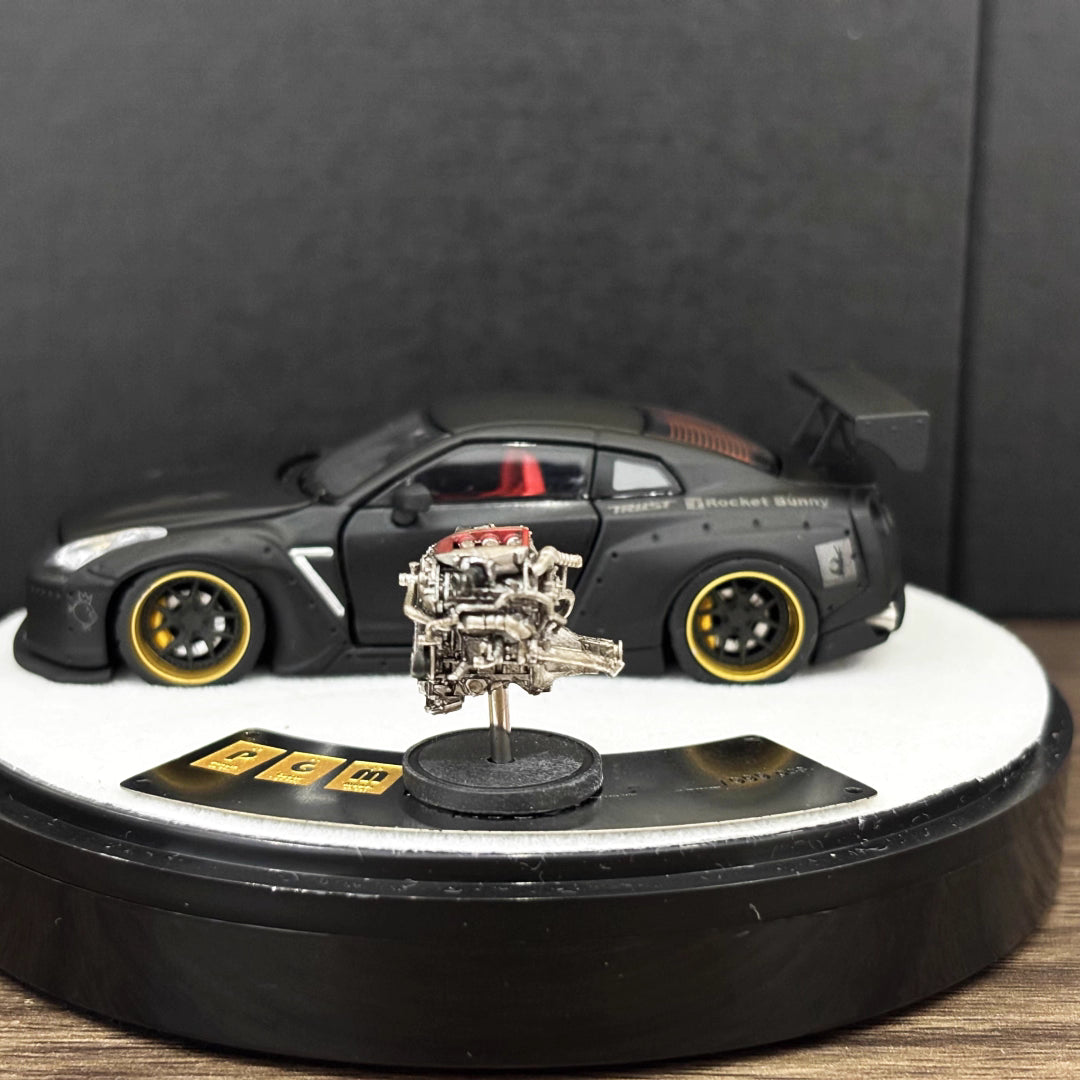 PGM 1:64 Nissan Skyline GT-R R35 Pandem Rocket Bunny Matt Black with Separated Display Engine Limited 999 Pieces (Premium Round Box Packaging)