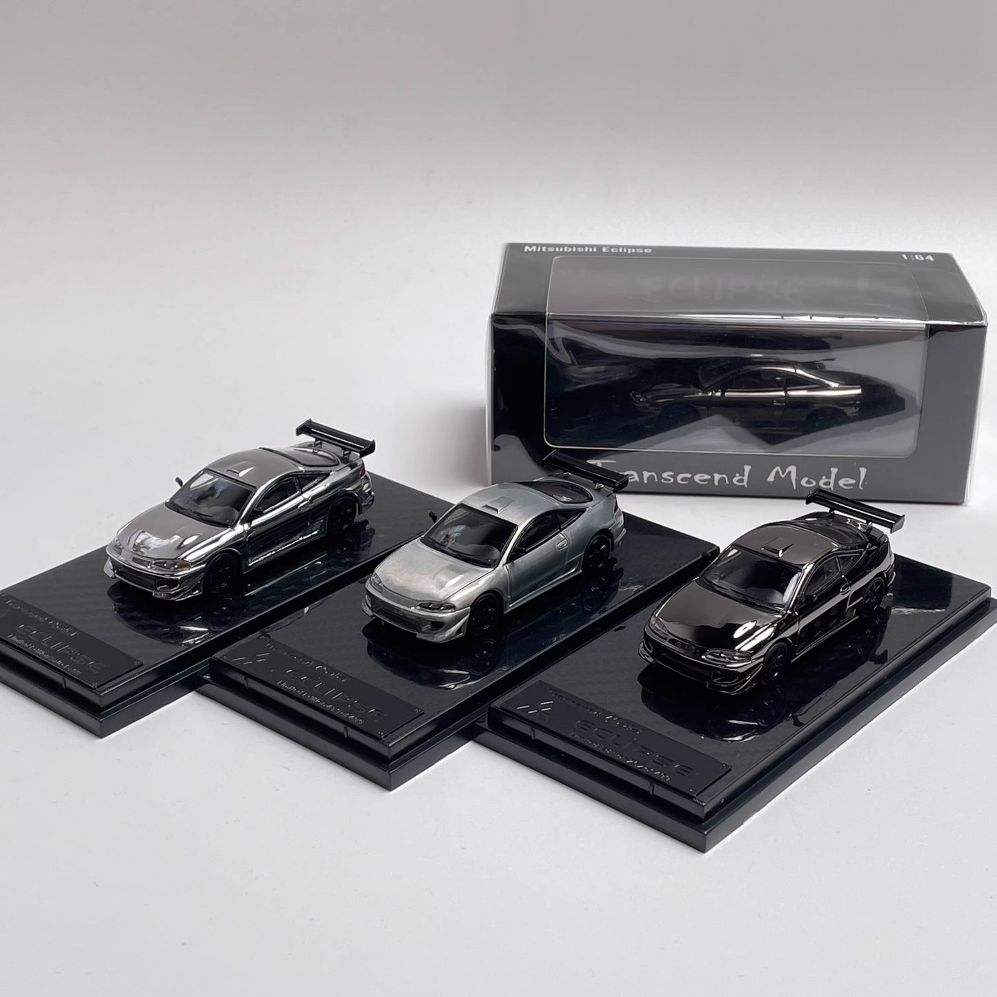 Transcend Model 1:64 Mitsubishi Eclipse Chrome Gun Grey