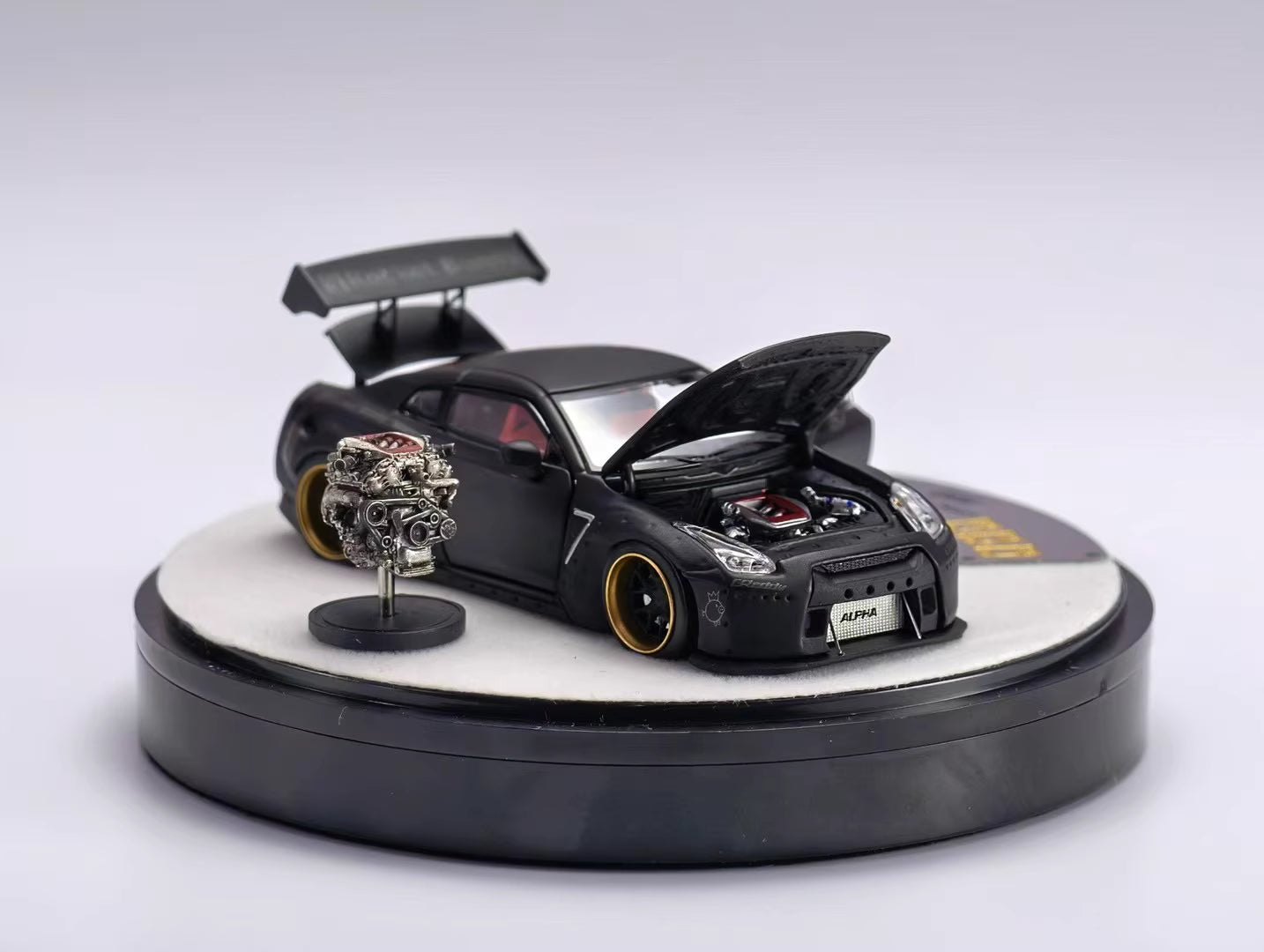 PGM 1:64 Nissan Skyline GT-R R35 Pandem Rocket Bunny Matt Black with Separated Display Engine Limited 999 Pieces (Premium Round Box Packaging)