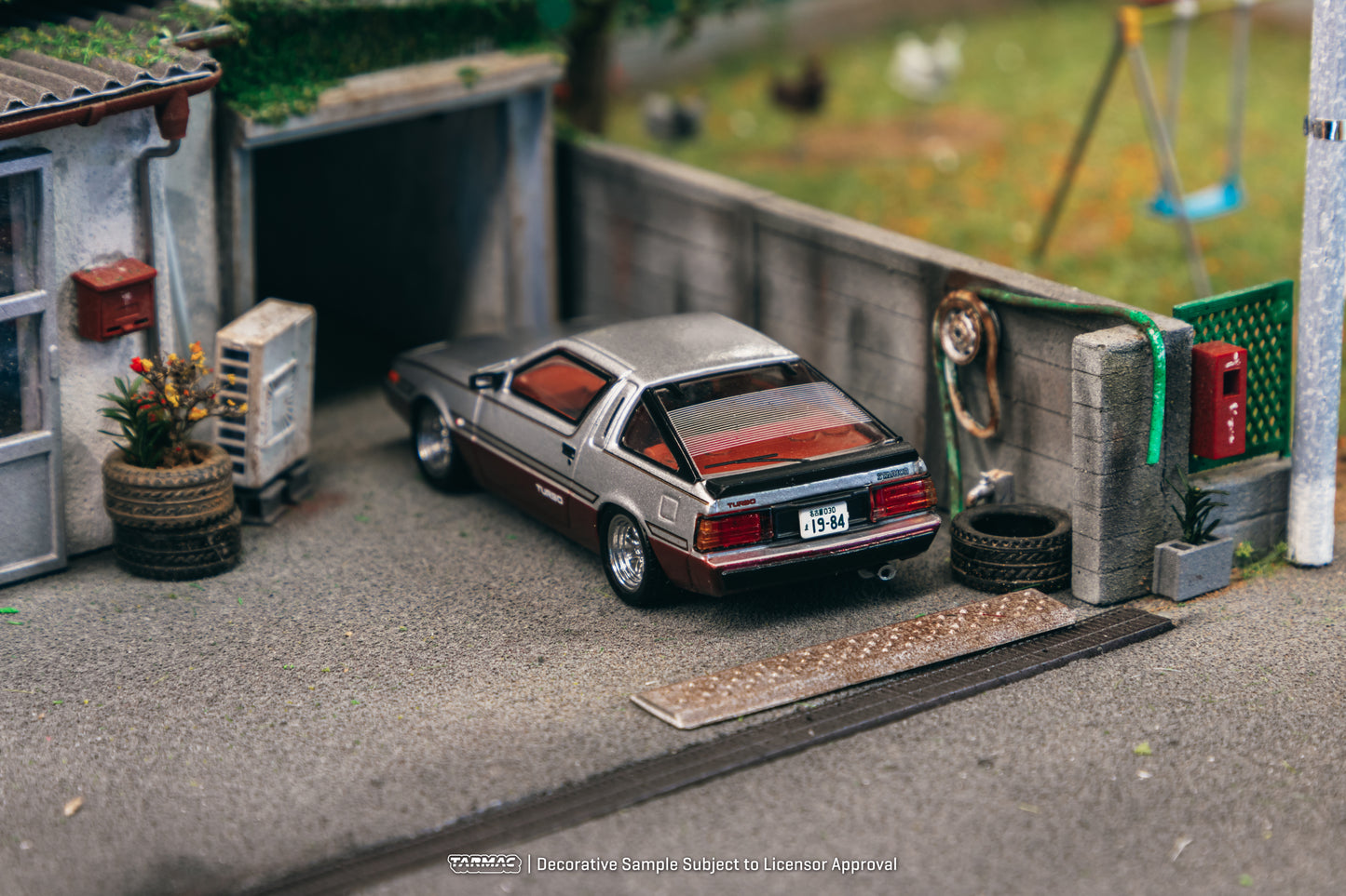 Tarmac Works 1/64 Mitsubishi Starion Silver / Dark Red - ROAD64