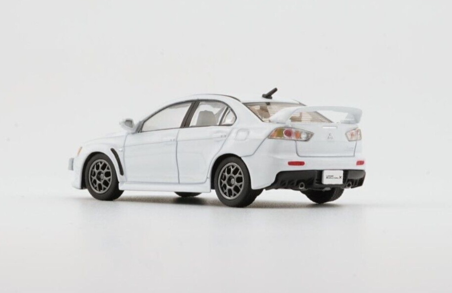 BM Creations 1/64 Mitsubishi Lancer Evolution X with 4 Additional Wheels-White (LHD)