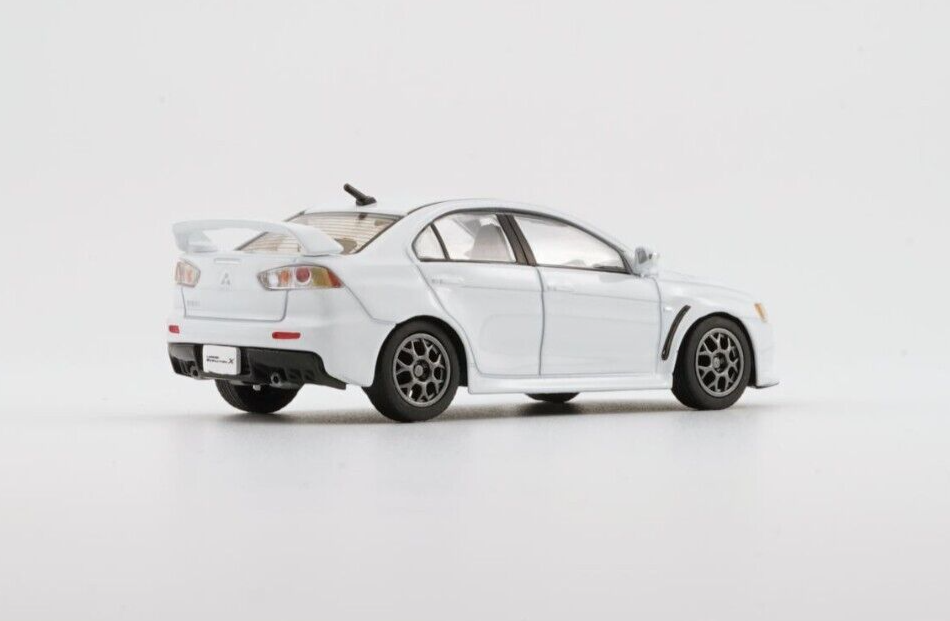 BM Creations 1/64 Mitsubishi Lancer Evolution X with 4 Additional Wheels-White (LHD)
