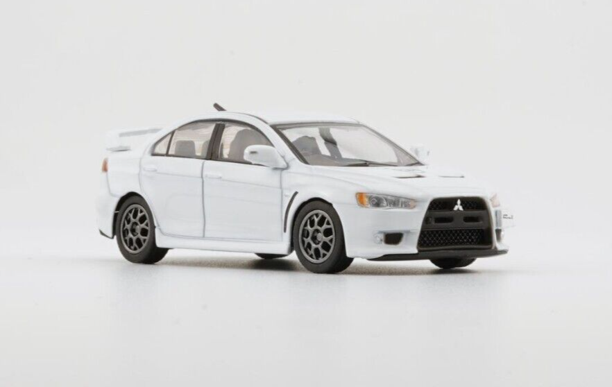 BM Creations 1/64 Mitsubishi Lancer Evolution X with 4 Additional Wheels-White (LHD)