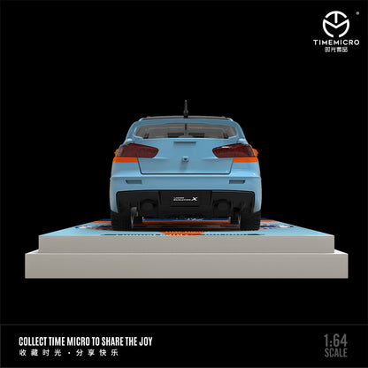 Time Micro 1:64 Mitsubishi Lancer Evolution X Evo 10 Gulf Edition with Model Girl Figure
