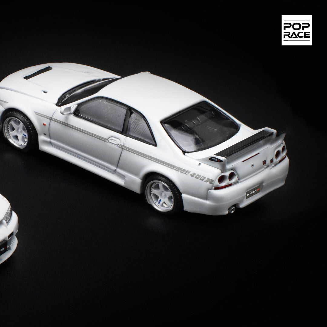Pop Race 1:64 Nissan Skyline GT-R R33 NISMO 400R White Opening Front and Rear (PR640052)