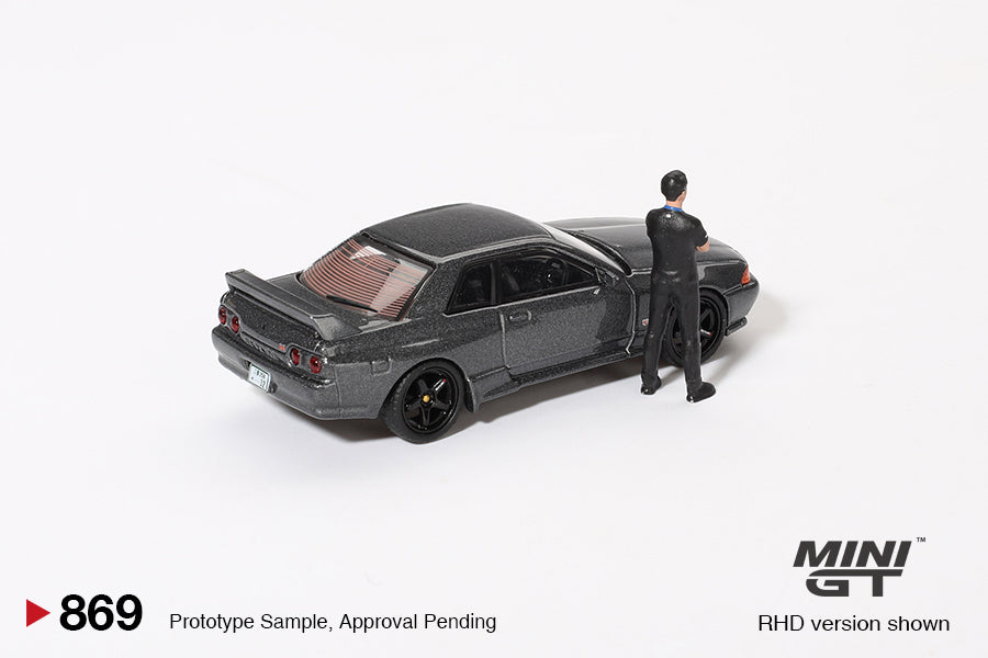 Mini GT 1:64 Nissan Skyline GT-R (R32) Gunmetal W/ Matsuda Figure Tsugio Matsuda Collection (MGT00869-R)