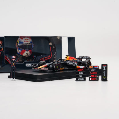 MINICHAMPS 1:64 ORACLE RED BULL RACING RB21 - MAX VERSTAPPEN - WINNER EMILIA-ROMAGNA GP 2025  With FIGURINE, 2X PITBOARD AND POSITION BOARD
