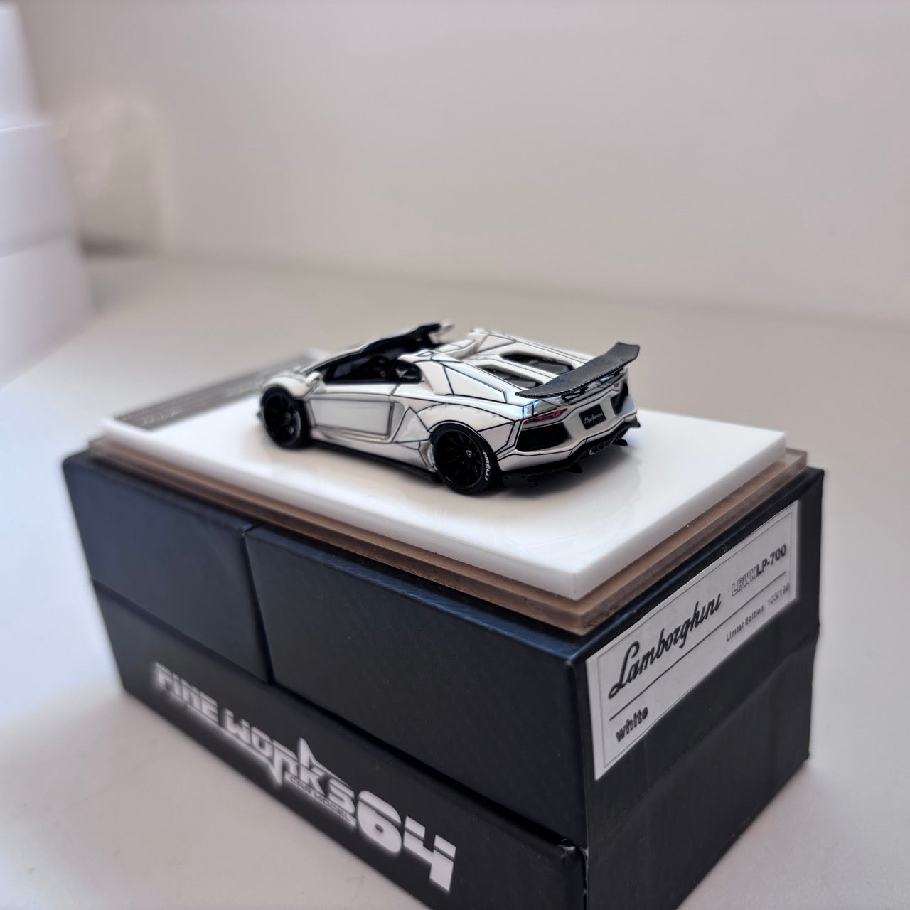 [3 Cars Bundle] Mini GT 1:64 Porsche 911 GT3 R #77 AO Racing 2025 IMSA Petit Le Mans in Paper Box Packaging (MGT01143-CH)  + [Premium Resin Model] Fine Works 1:64 Aventador LP700-4 White Black Panel Lines + DCM 1:64 RWB 993 Duck Tail Green