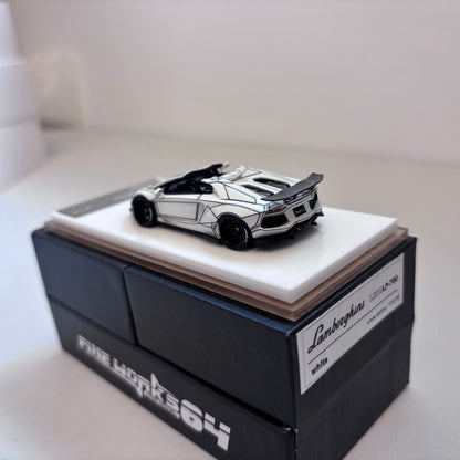 [3 Cars Bundle] Mini GT 1:64 Porsche 911 GT3 R #77 AO Racing 2025 IMSA Petit Le Mans in Paper Box Packaging (MGT01143-CH)  + [Premium Resin Model] Fine Works 1:64 Aventador LP700-4 White Black Panel Lines + DCM 1:64 RWB 993 Duck Tail Green