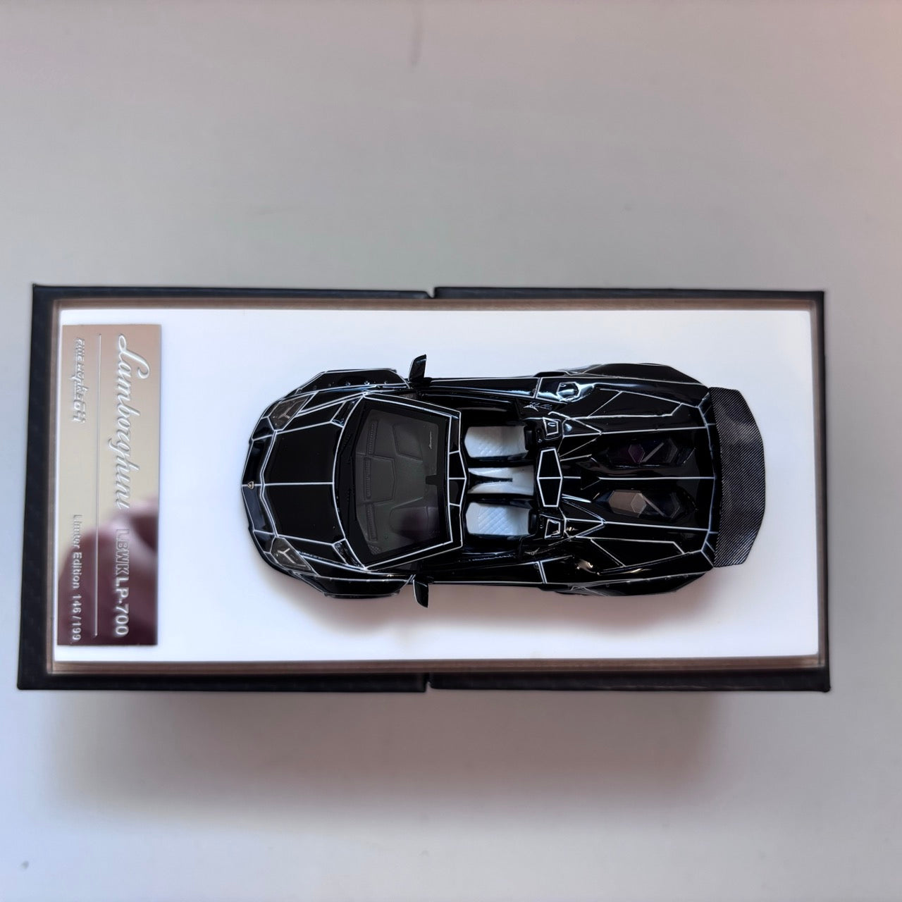 [3 Cars Bundle] Mini GT 1:64 Porsche 911 GT3 R #77 AO Racing 2025 IMSA Petit Le Mans in Paper Box Packaging (MGT01143-CH)  + [Premium Resin Model] Fine Works 1:64 Aventador LP700-4 Black White Panel Lines+ Fine Works 1:64 Camaro Transformers White