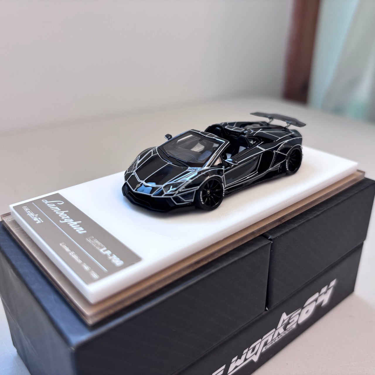 [3 Cars Bundle] Mini GT 1:64 Porsche 911 GT3 R #77 AO Racing 2025 IMSA Petit Le Mans in Paper Box Packaging (MGT01143-CH)  + [Premium Resin Model] Fine Works 1:64 Aventador LP700-4 Black White Panel Lines+ Fine Works 1:64 Camaro Transformers White