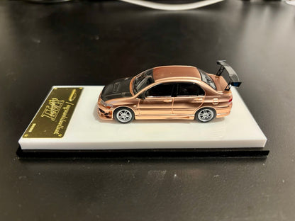 Model Collect 1:64 Mitsubishi Lancer Evolution 7 EVO VII Rose Gold with Carbon Hood