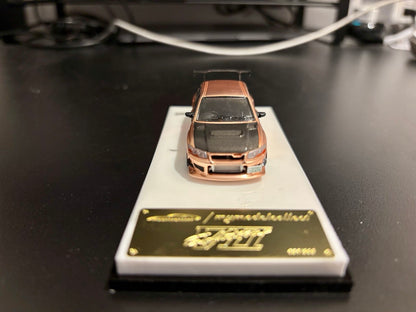 Model Collect 1:64 Mitsubishi Lancer Evolution 7 EVO VII Rose Gold with Carbon Hood