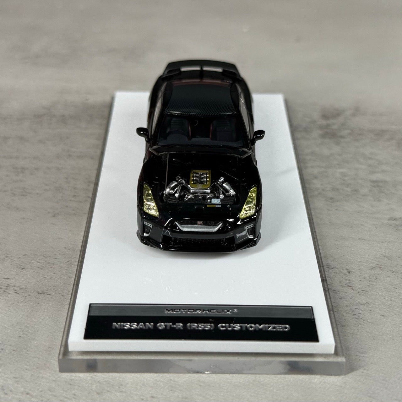 Motorhelix 1:64 Nissan GT-R R35 Pearl Black Customized Head Light Openable Front Hood Detailed Engine Official Licensed (Premium Box Packaging)