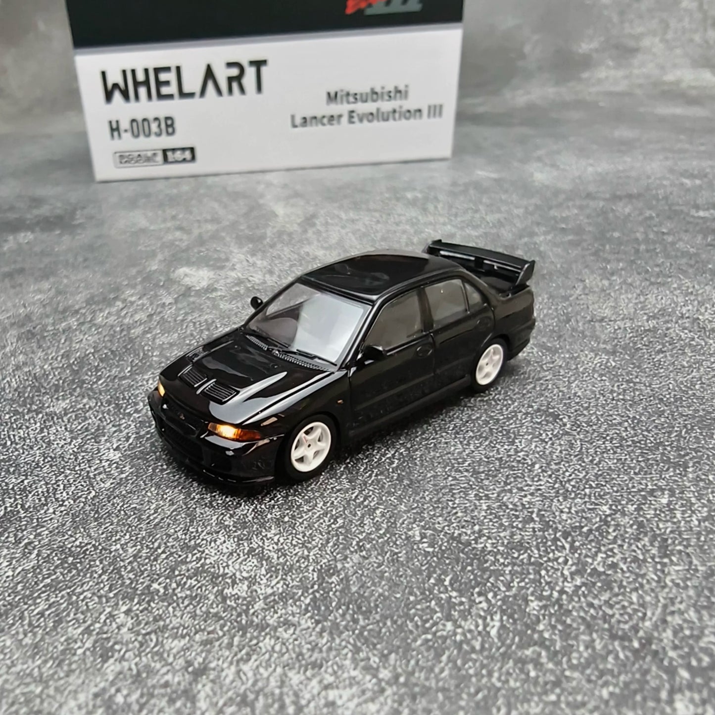 Whelart 1:64 Mitsubishi Lancer Evolution III Black LED Head and Back Lights with Car Key Shape Controller in Premium Box Packaging (Official Licensed)
