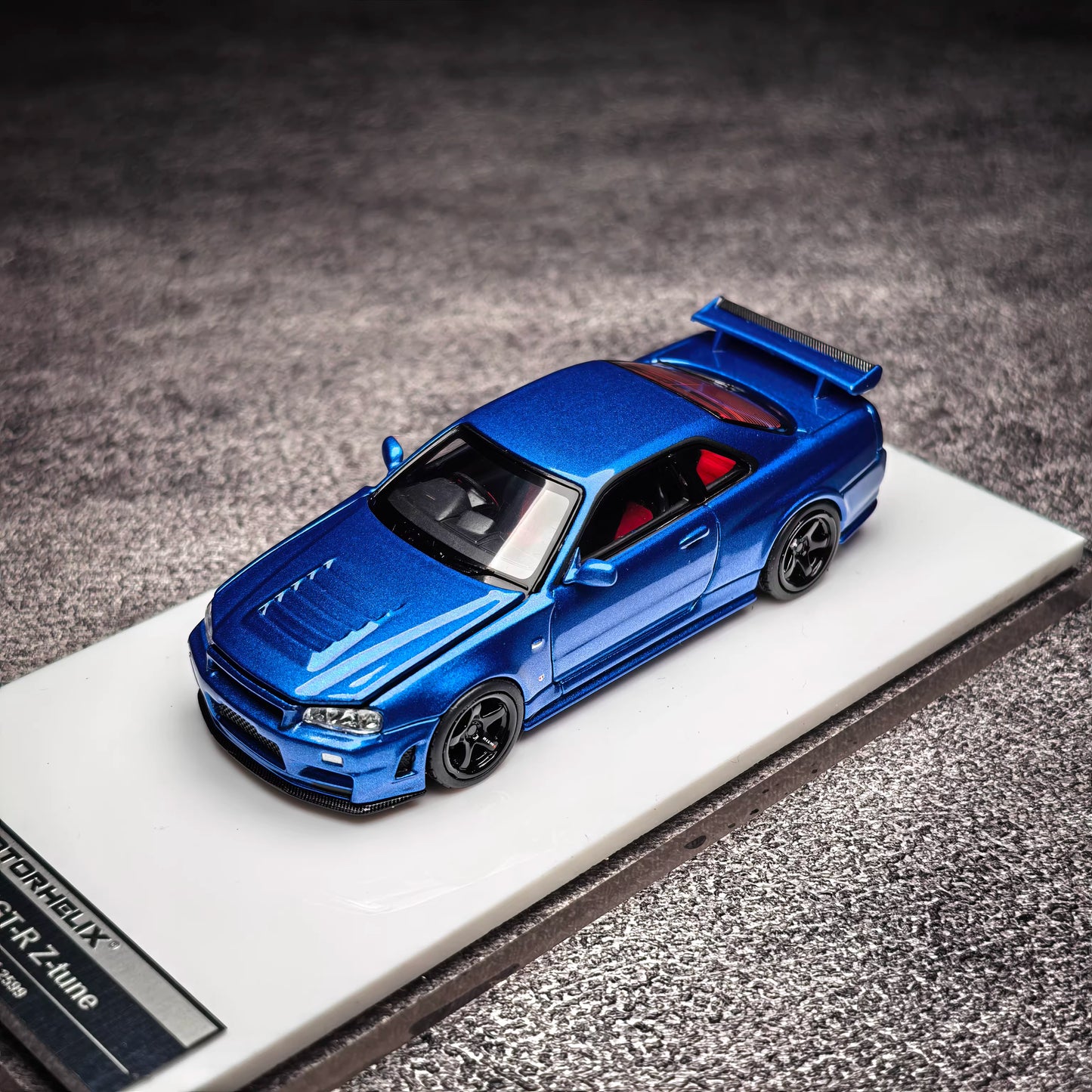 Motorhelix 1:64 Nissan Skyline GT-R R34 Nismo Z-Tune Bayside Blue Openable Front Hood Detailed Engine Official Licensed (Premium Box Packaging)