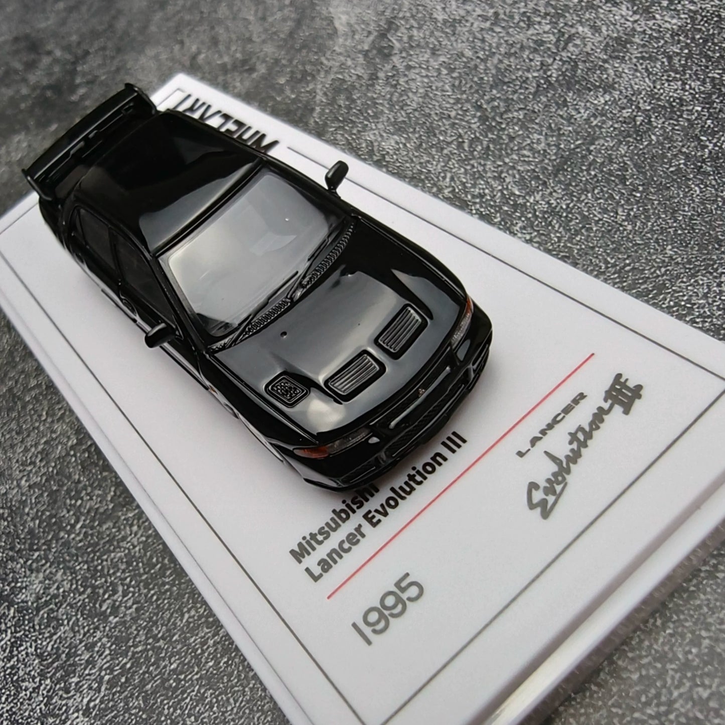 Whelart 1:64 Mitsubishi Lancer Evolution III Black LED Head and Back Lights with Car Key Shape Controller in Premium Box Packaging (Official Licensed)