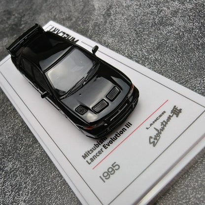Whelart 1:64 Mitsubishi Lancer Evolution III Black LED Head and Back Lights with Car Key Shape Controller in Premium Box Packaging (Official Licensed)