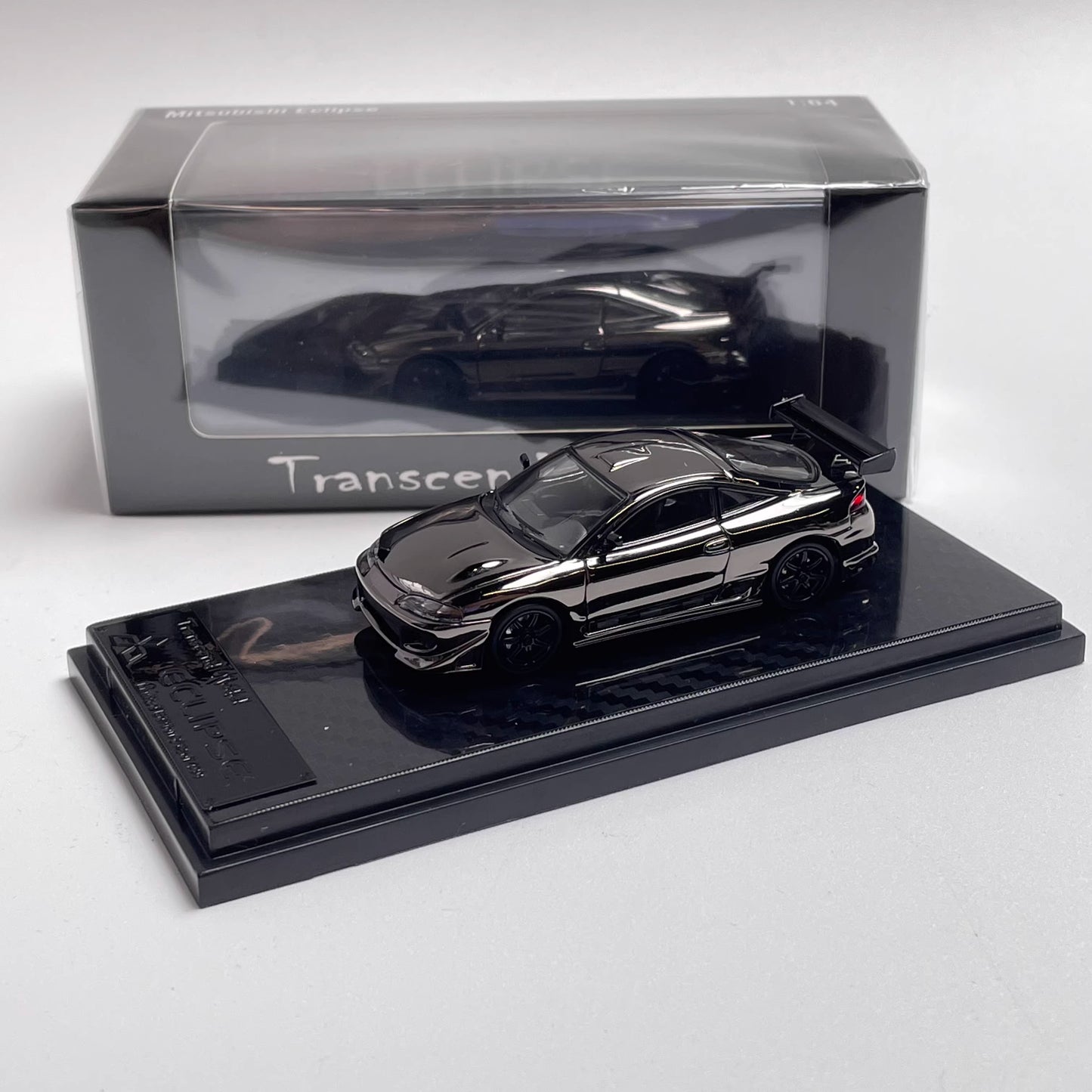 Transcend Model 1:64 Mitsubishi Eclipse Chrome Gun Grey