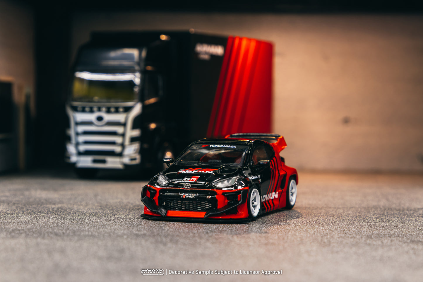 Tarmac Works 1/64 Toyota Pandem Yaris ADVAN with Plastic Truck Packaging - HOBBY64