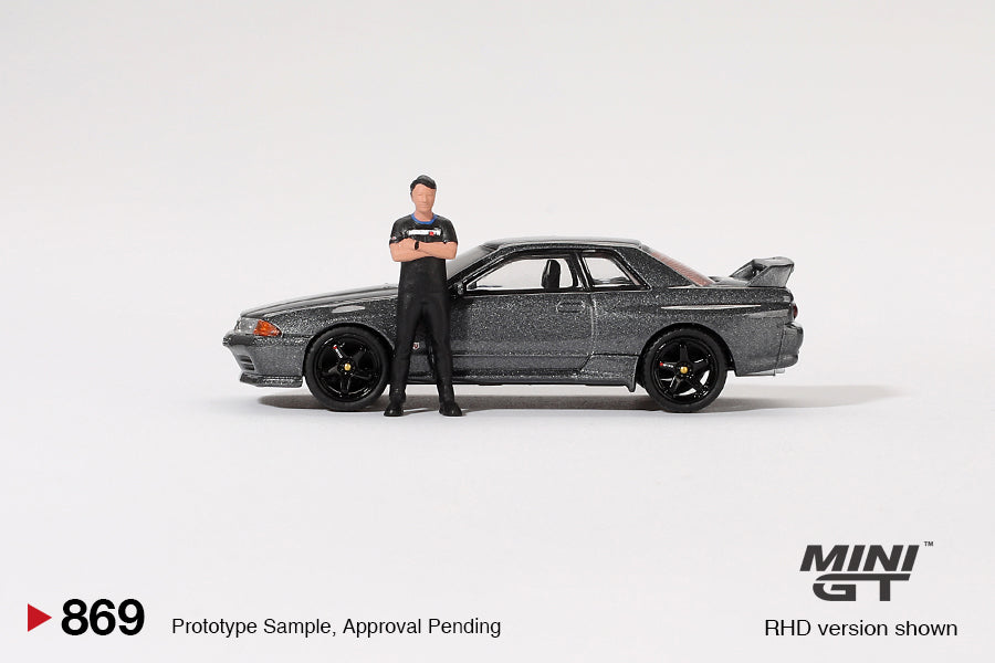 Mini GT 1:64 Nissan Skyline GT-R (R32) Gunmetal W/ Matsuda Figure Tsugio Matsuda Collection (MGT00869-R)