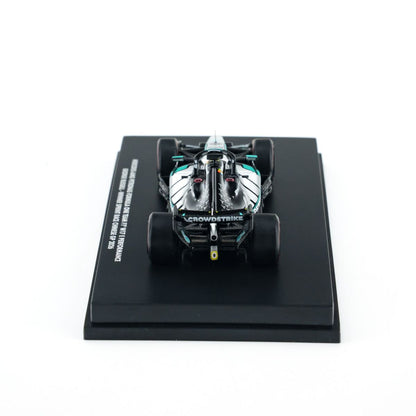 MINICHAMPS 1:64 MERCEDES-AMG PETRONAS FORMULA ONE TEAM W17 - GEORGE RUSSELL - WINNER SPRINT CHINA GP 2026 With FIGURINE AND POSITION BOARD