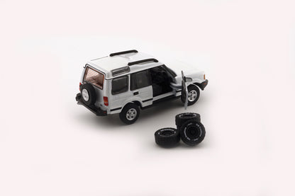 BM Creations 1/64 Land Rover 1998 Discovery 1 with 4 Additional Wheels- White (RHD)