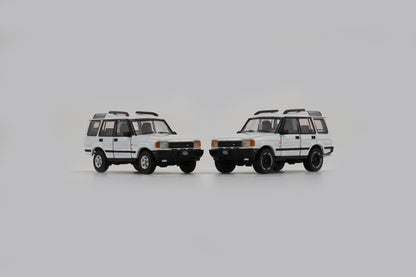 BM Creations 1/64 Land Rover 1998 Discovery 1 with 4 Additional Wheels- White (RHD)